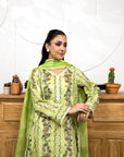 Woman wearing a green floral dress with a white background